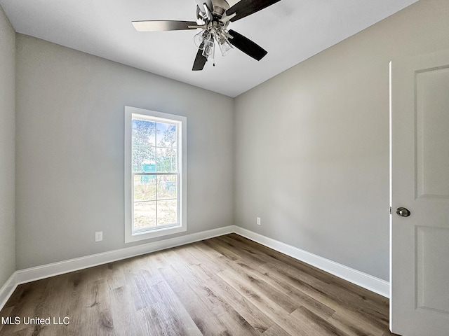 354 Willow Way, Canton, MS 39046 - unfurnished room featuring baseboards, wood finished floors, and ceiling fan