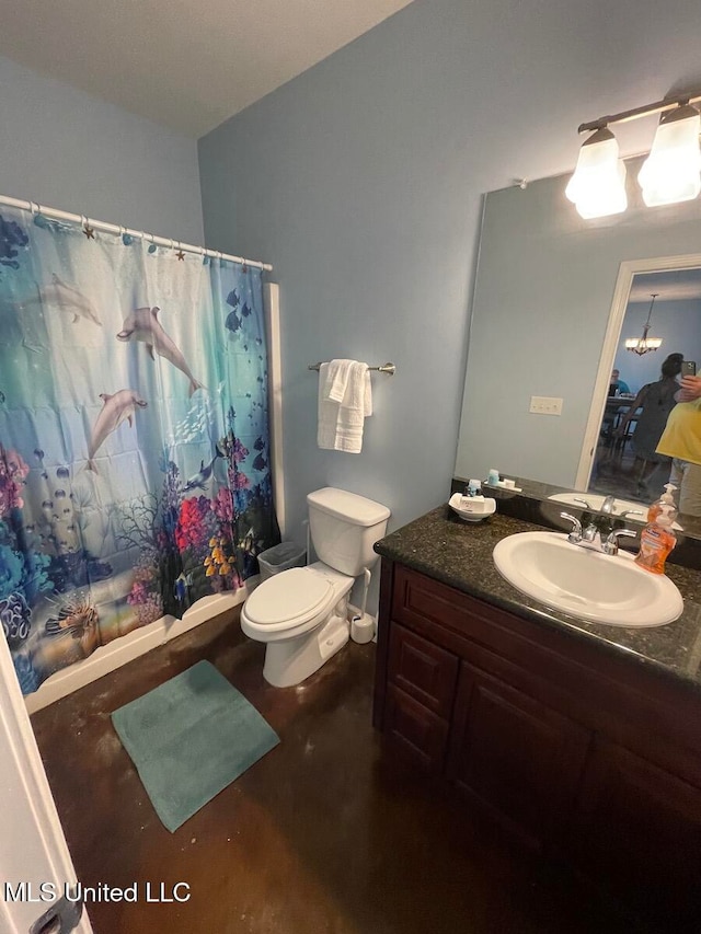 bathroom featuring vanity, toilet, a notable chandelier, and concrete flooring