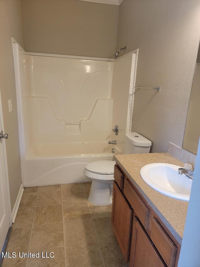 13497 Artes St, Gulfport, MS 39503 - bathroom featuring toilet, shower / washtub combination, vanity, and tile patterned flooring