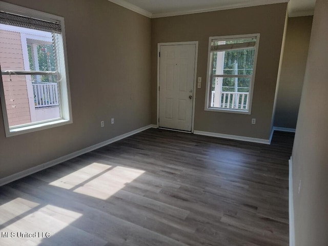 13497 Artes St, Gulfport, MS 39503 - empty room with ornamental molding, wood finished floors, and baseboards