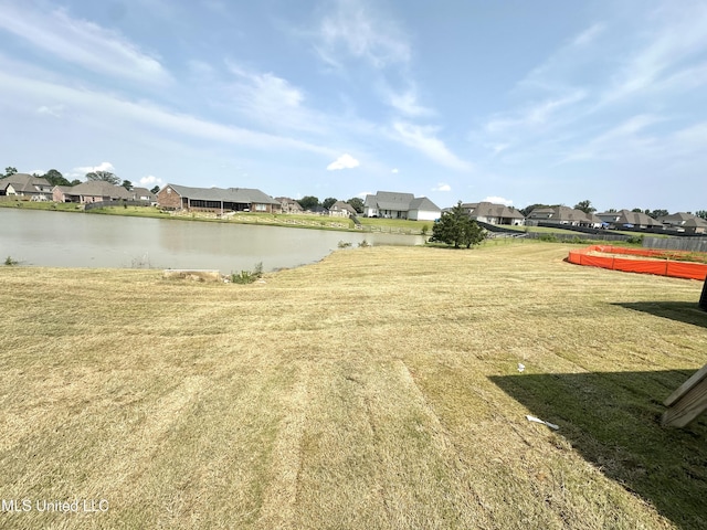 3755 Roland Dr, Southaven, MS 38672 - view of green lawn featuring a residential view and a water view