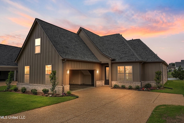 3755 Roland Dr, Southaven, MS 38672 - view of front of home with a garage, board and batten siding, concrete driveway, and a shingled roof