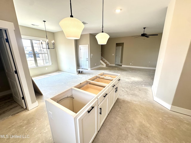 3755 Roland Dr, Southaven, MS 38672 - kitchen featuring white cabinetry, decorative light fixtures, open floor plan, ceiling fan, and a chandelier