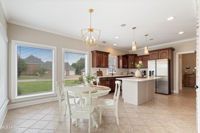 6507 Shenandoah Ln, Olive Branch, MS 38654 - dining space featuring recessed lighting, a chandelier, ornamental molding, and light tile patterned floors
