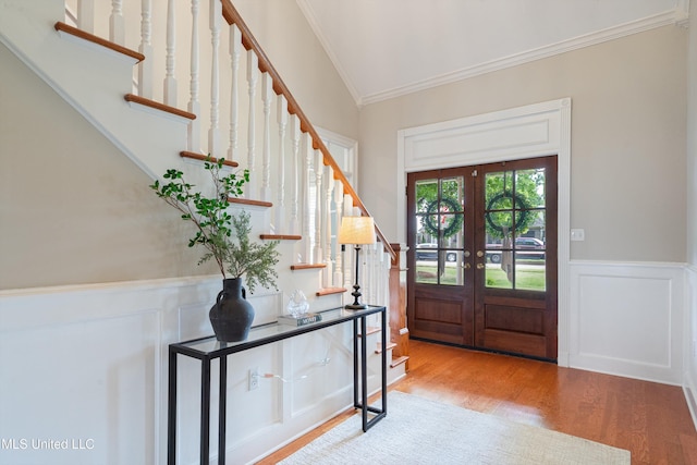 6507 Shenandoah Ln, Olive Branch, MS 38654 - foyer with french doors, vaulted ceiling, wood finished floors, stairway, and ornamental molding