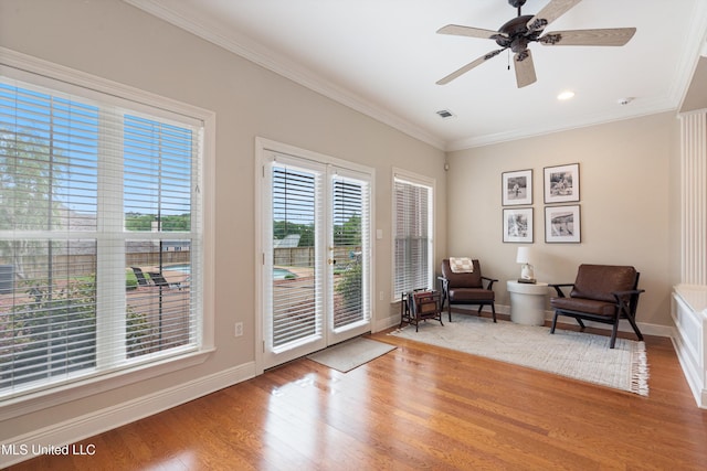 6507 Shenandoah Ln, Olive Branch, MS 38654 - sitting room with ceiling fan, visible vents, crown molding, wood finished floors, and baseboards