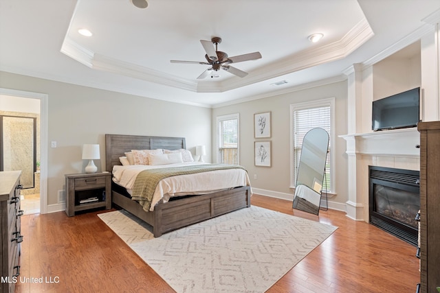 6507 Shenandoah Ln, Olive Branch, MS 38654 - bedroom featuring ornamental molding, wood finished floors, and a raised ceiling