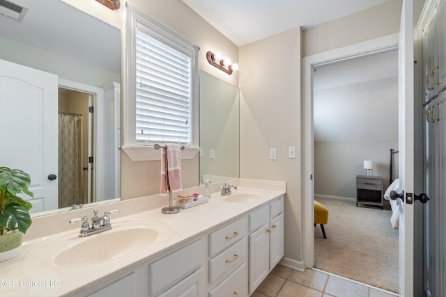 6507 Shenandoah Ln, Olive Branch, MS 38654 - bathroom with a sink, tile patterned flooring, double vanity, and visible vents