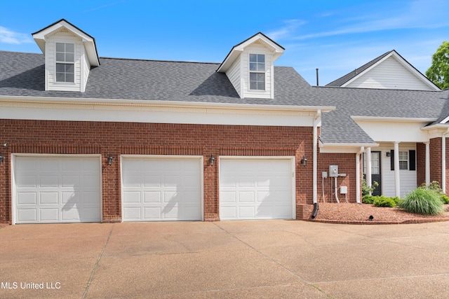 6507 Shenandoah Ln, Olive Branch, MS 38654 - view of front of home featuring brick siding, roof with shingles, and concrete driveway