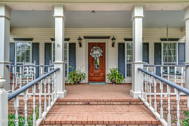 property entrance with a porch