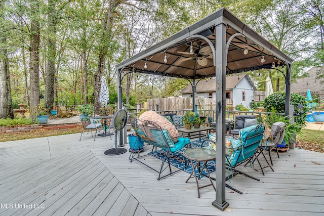 wooden terrace with a gazebo