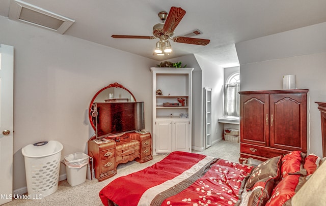 bedroom with light carpet and ceiling fan