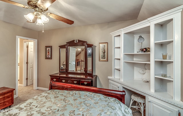 bedroom with ceiling fan and light carpet