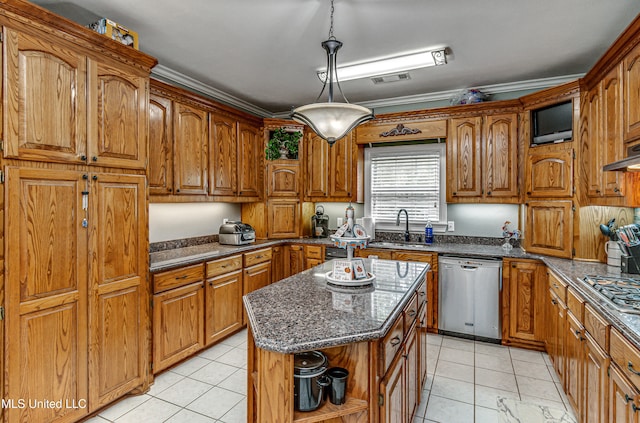 kitchen with stainless steel appliances, a center island, sink, crown molding, and decorative light fixtures