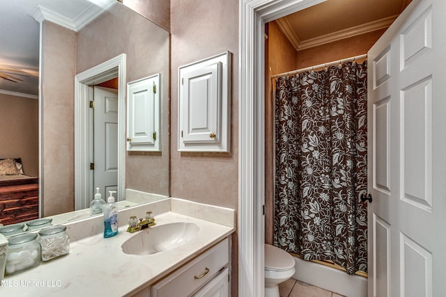 bathroom featuring ornamental molding, vanity, and tile patterned floors