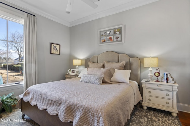 bedroom with ornamental molding, dark wood-style flooring, multiple windows, and baseboards