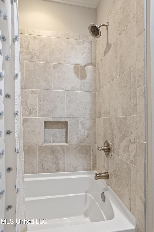 full bath featuring shower / bath combo with shower curtain