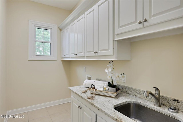 407 Belle Pointe Ln, Madison, MS 39110 - washroom featuring baseboards, light tile patterned flooring, cabinet space, and washer hookup