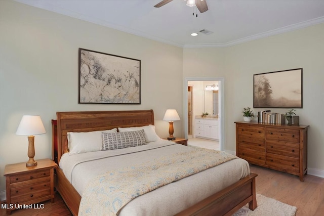 407 Belle Pointe Ln, Madison, MS 39110 - bedroom with crown molding, light wood finished floors, baseboards, ensuite bathroom, and a ceiling fan