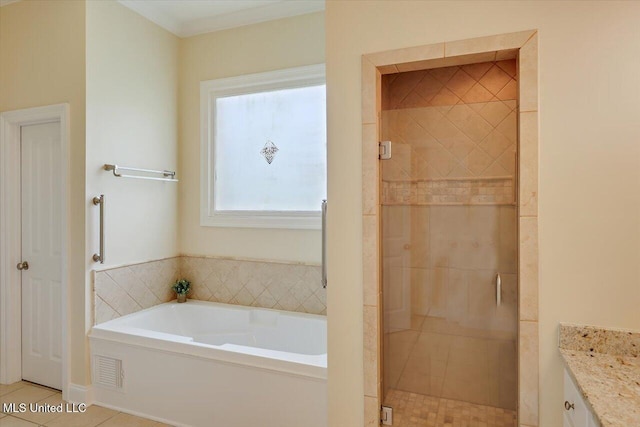 407 Belle Pointe Ln, Madison, MS 39110 - bathroom featuring a garden tub, a shower stall, tile patterned floors, and vanity