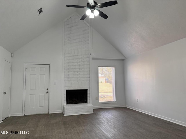 unfurnished living room featuring dark hardwood / wood-style flooring, a fireplace, high vaulted ceiling, and ceiling fan