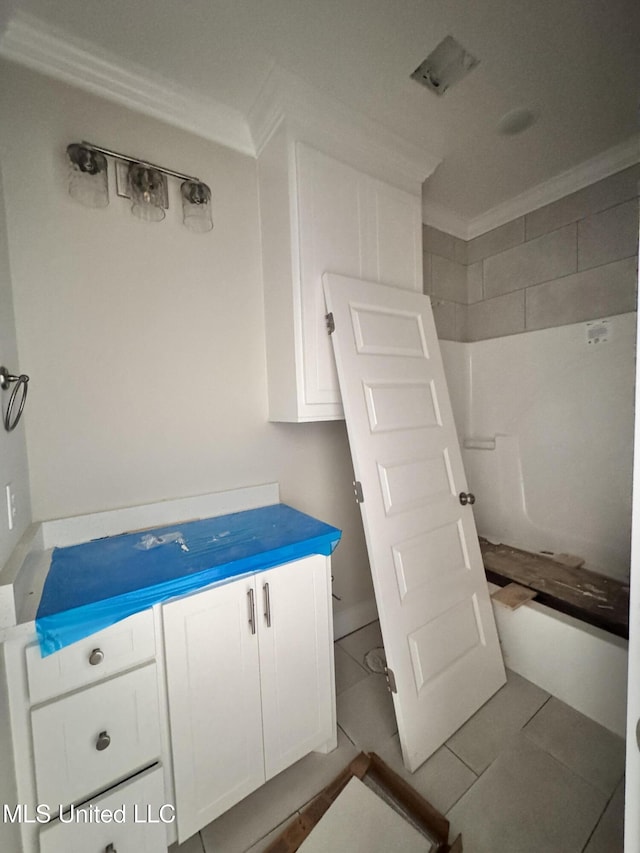 652 Prosperity Pl, Brandon, MS 39042 - bathroom featuring ornamental molding, vanity, and tile patterned floors