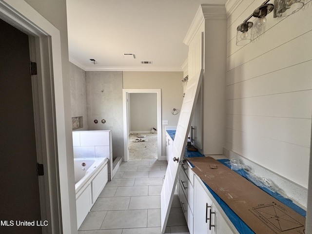 652 Prosperity Pl, Brandon, MS 39042 - bathroom featuring a garden tub, tile patterned flooring, ornamental molding, vanity, and a walk in shower