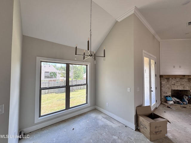 652 Prosperity Pl, Brandon, MS 39042 - unfurnished dining area featuring crown molding and a brick fireplace