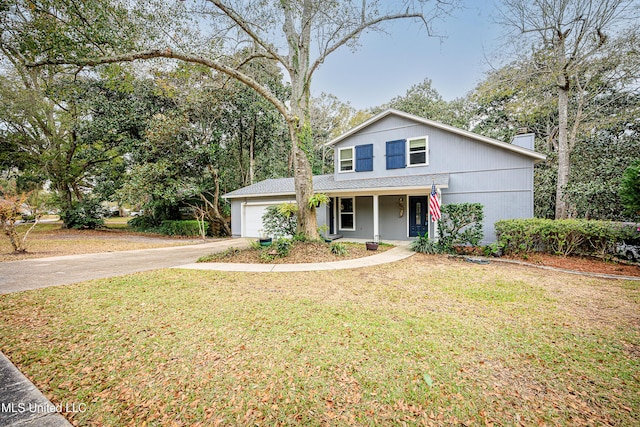 front facade with a garage, covered porch, and a front lawn