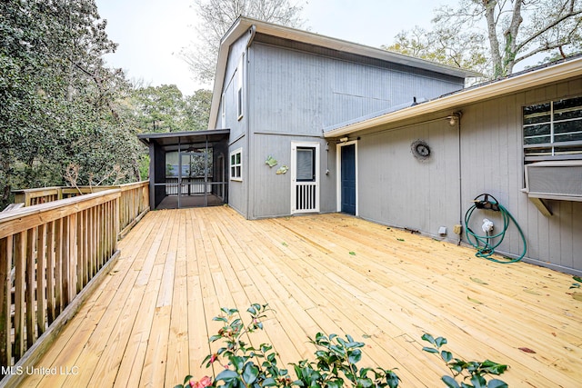 wooden terrace featuring a sunroom