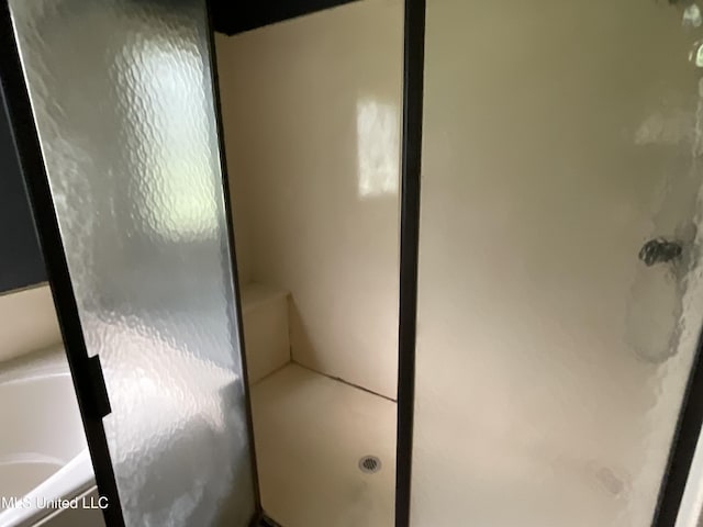 bathroom with a stall shower