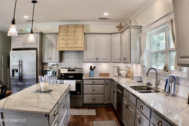 605 Magnolia St, Long Beach, MS 39560 - kitchen with appliances with stainless steel finishes, gray cabinets, premium range hood, dark wood-style floors, and light stone counters
