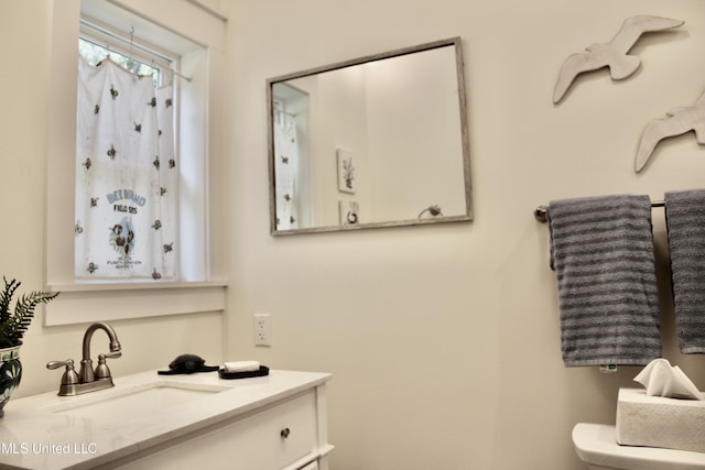 605 Magnolia St, Long Beach, MS 39560 - bathroom featuring vanity and curtained shower