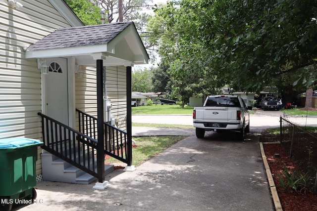 2411 14th St, Pascagoula, MS 39567 - exterior space with roof with shingles