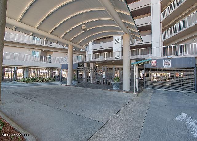 entrance to property with a balcony