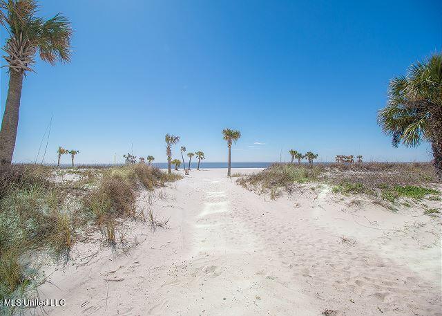 exterior space with a view of the beach and a water view