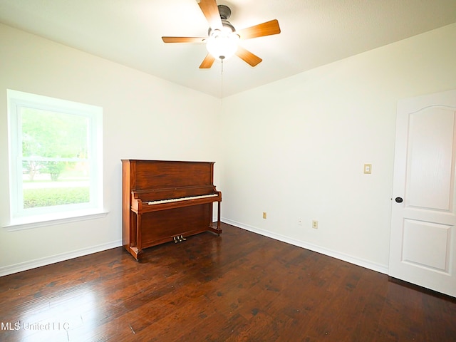 7869 Hilo Way, Diamondhead, MS 39525 - unfurnished room featuring baseboards, ceiling fan, and dark wood-type flooring