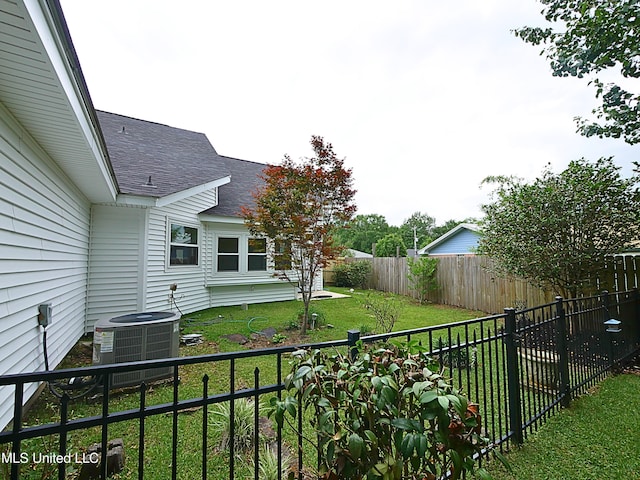 7869 Hilo Way, Diamondhead, MS 39525 - view of yard featuring central AC unit
