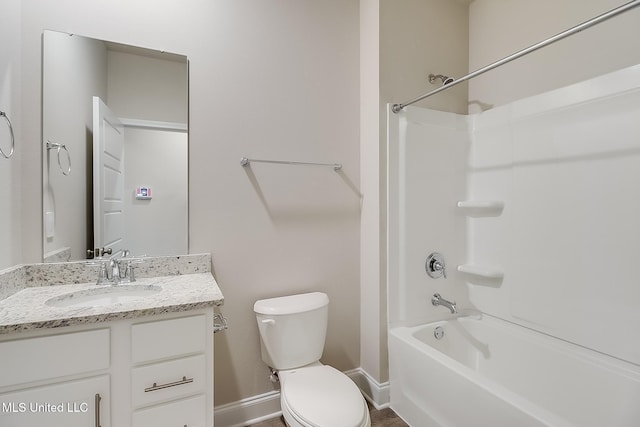 full bathroom with toilet, vanity, and shower / bath combination