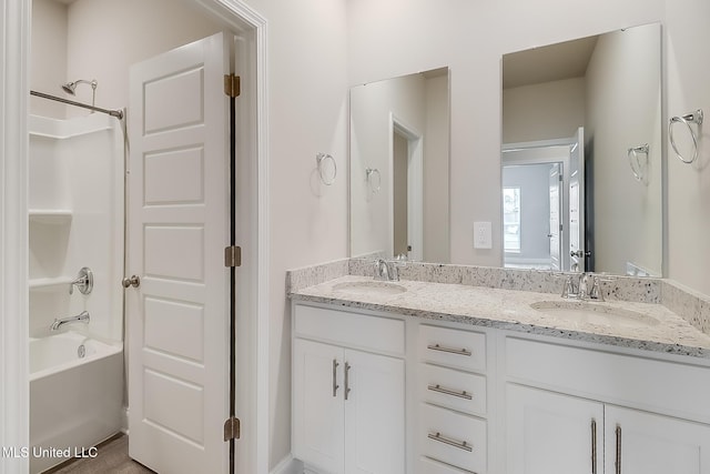 bathroom with vanity and shower / bathtub combination