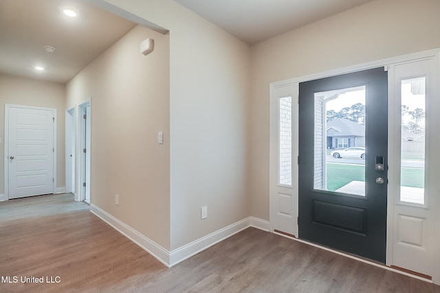 entryway with light hardwood / wood-style flooring