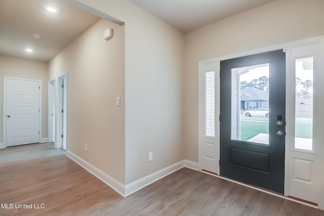 6253 Sandhill Cv, Ocean Springs, MS 39564 - entryway with light wood-type flooring, plenty of natural light, baseboards, and recessed lighting