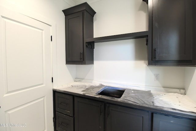 kitchen with light stone countertops