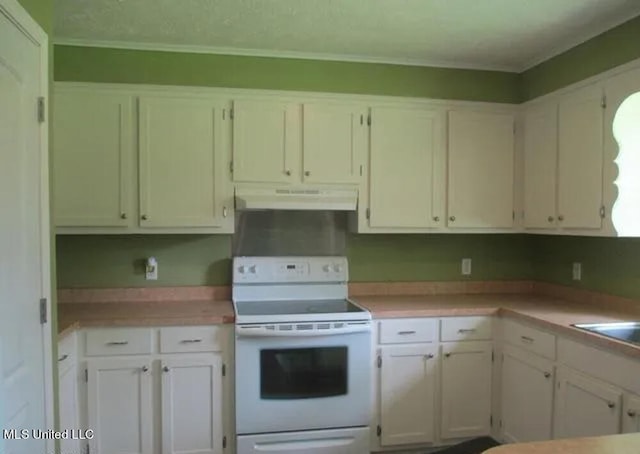 kitchen with ornamental molding, white cabinetry, and white electric range