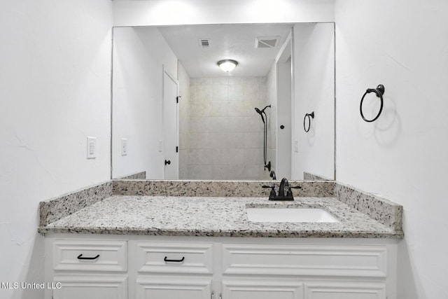 132 Bent Creek Dr, Brandon, MS 39047 - bathroom with vanity and a tile shower