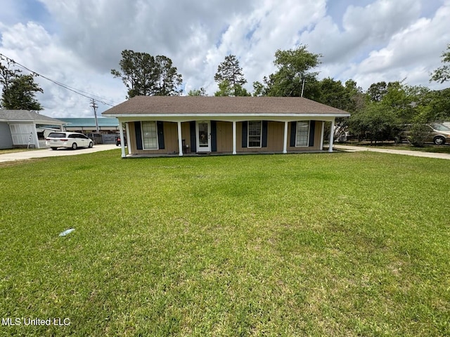 710 Beyer Dr, Bay Saint Louis, MS 39520 - view of front of property featuring a front lawn, covered porch, and driveway