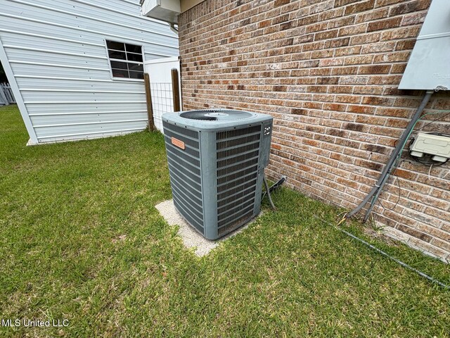 710 Beyer Dr, Bay Saint Louis, MS 39520 - details featuring brick siding and central AC unit