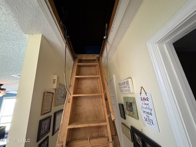 710 Beyer Dr, Bay Saint Louis, MS 39520 - stairs featuring ceiling fan