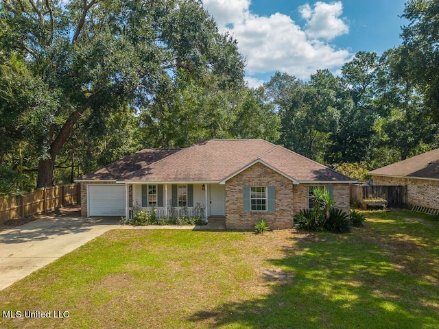 single story home with a garage, covered porch, and a front lawn