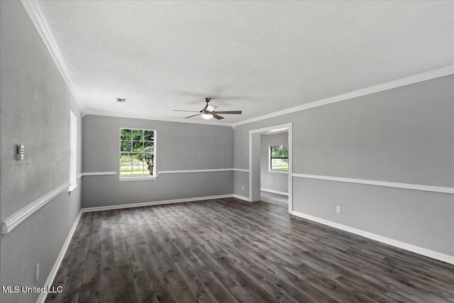 spare room featuring a textured ceiling, dark hardwood / wood-style flooring, ceiling fan, and crown molding